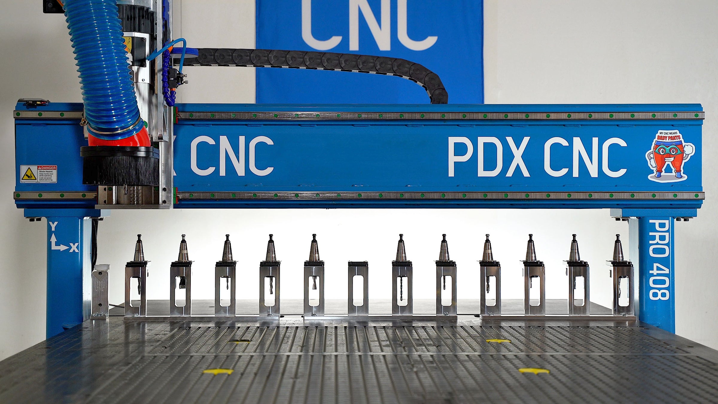Upgraded ShopSabre CNC Router with more tools and better dust collection
